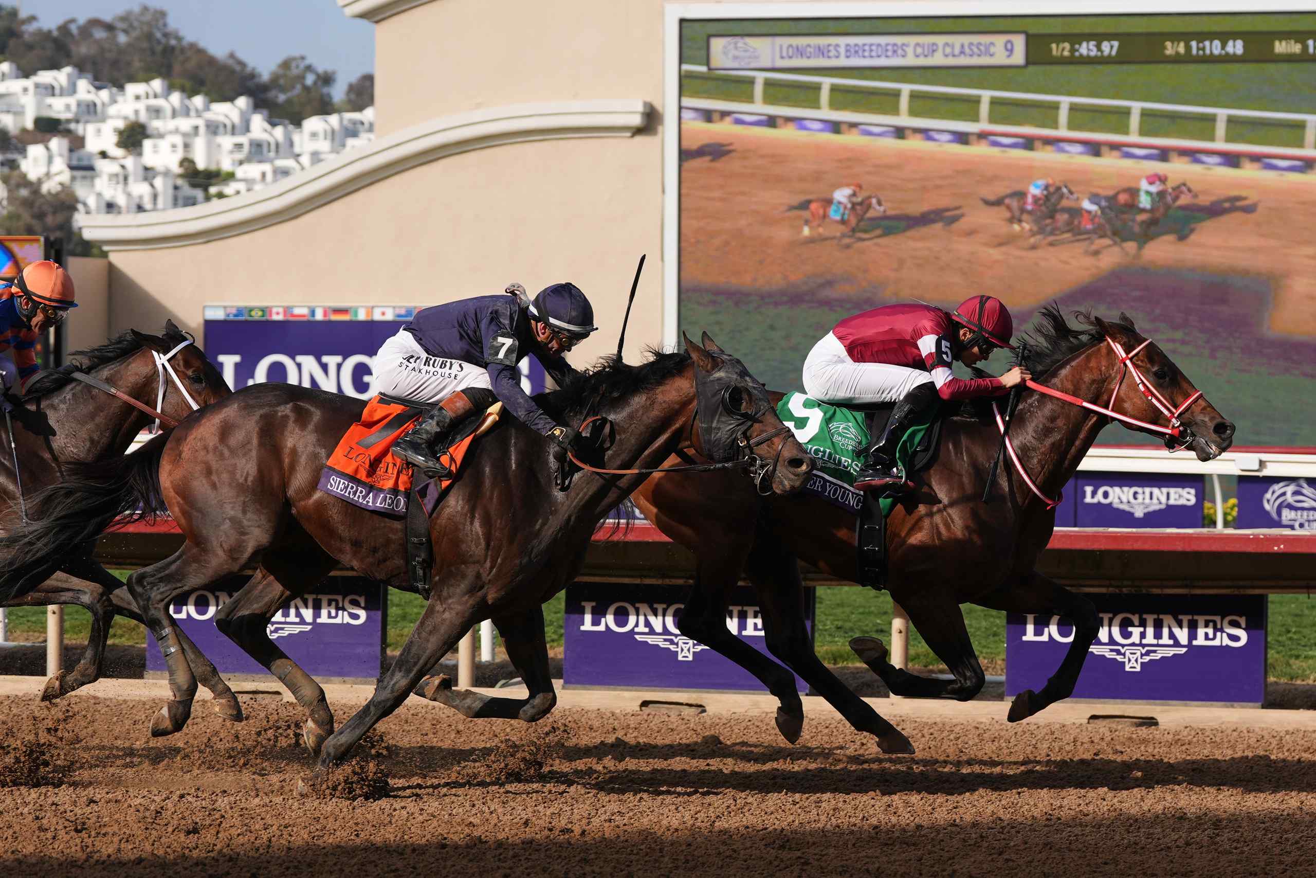Ryusei Sakai, right, rides Forever Young past Flavien Prat (7), riding Sierra Leone, to win the Breeders' Cup Classic horse race on Saturday, Nov. 1, 2025