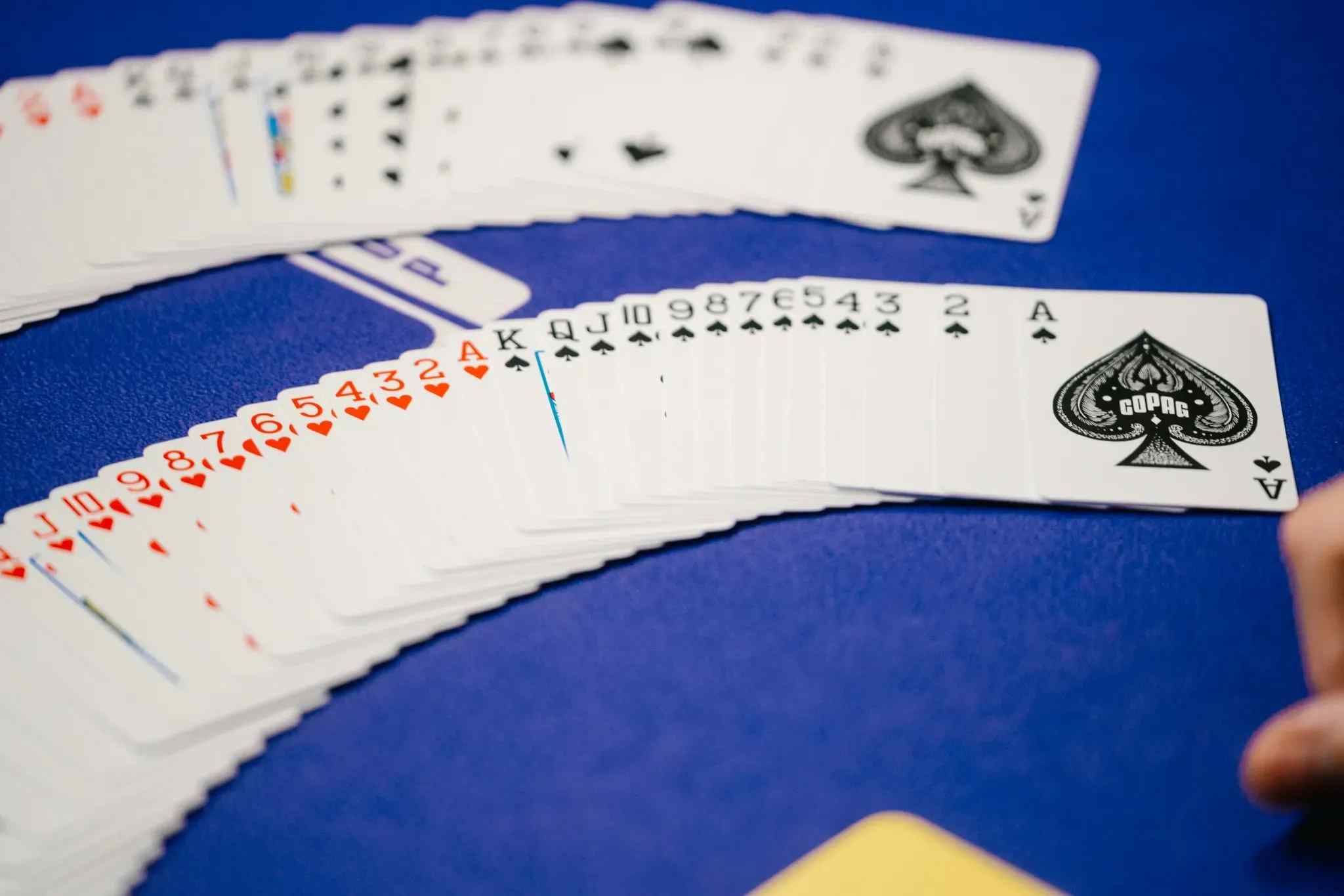 Two rows of cards on a poker table